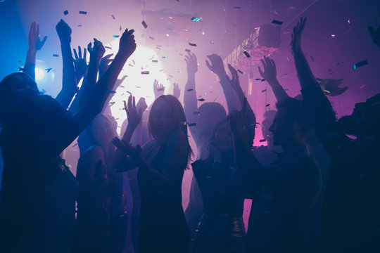People partying at prom. Photo Credit: Adobe Stock.