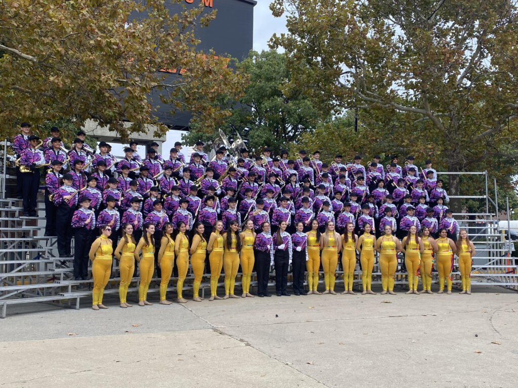 All the members of the Marching Tigers after their final performance at the University of Illinois Urbana-Champaign. Photo credit: Tim Hatcher.
