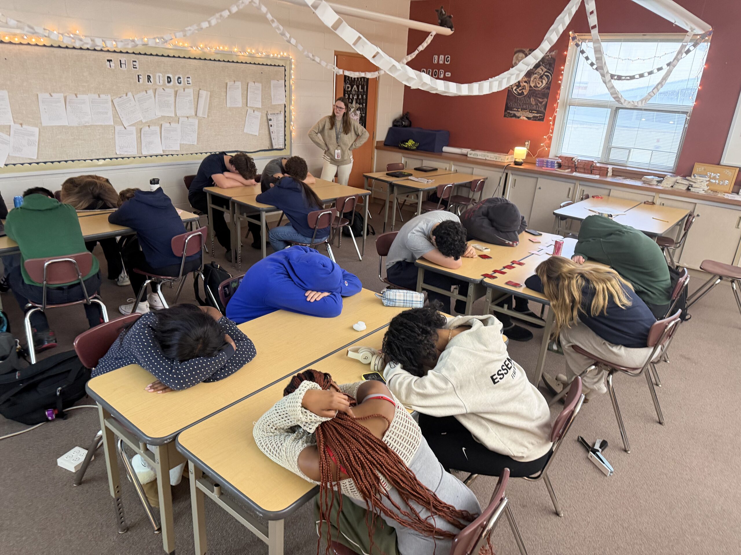 Teacher Abigail Greetis appalled after her exhausted students are all caught sleeping during her class. Photo by Hilde Trinidad.